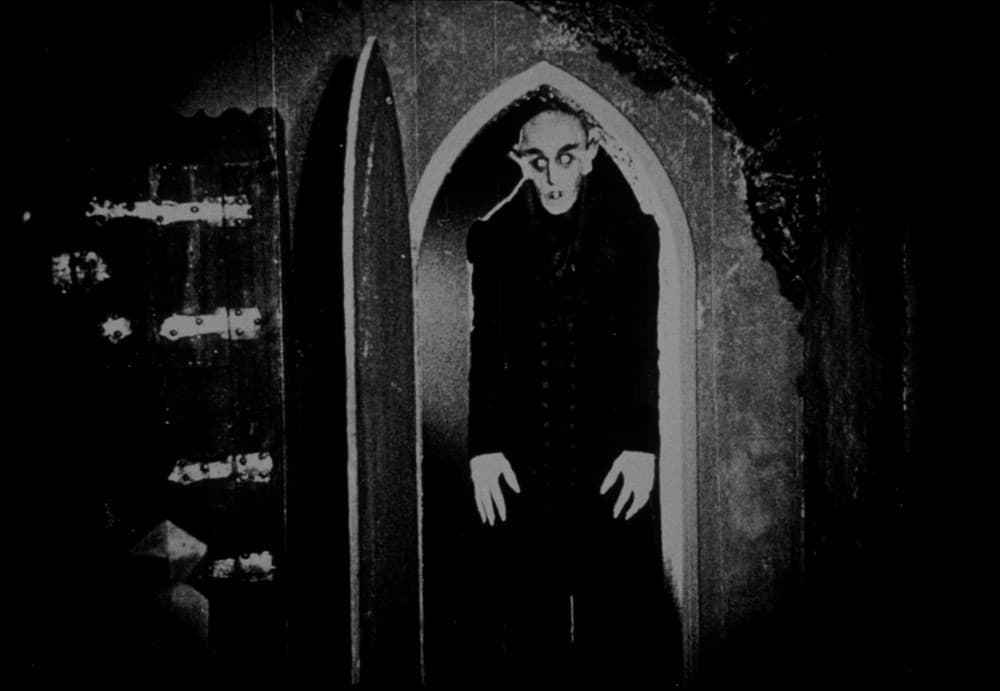 Lost Boys standing in their secret hideout