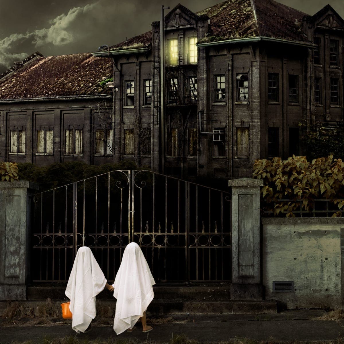 a haunted house with ghosts on it